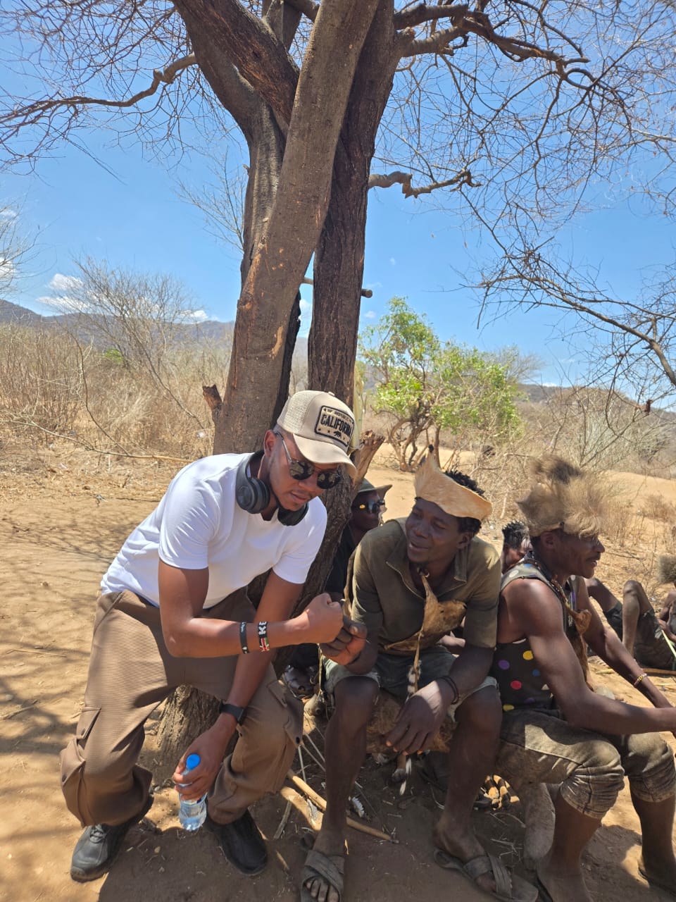 William spending time with Hadzabe people during a visit in Tanzania